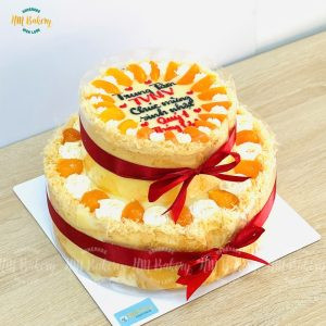 Bánh bông lan trứng muối hai tầng nơ đỏ