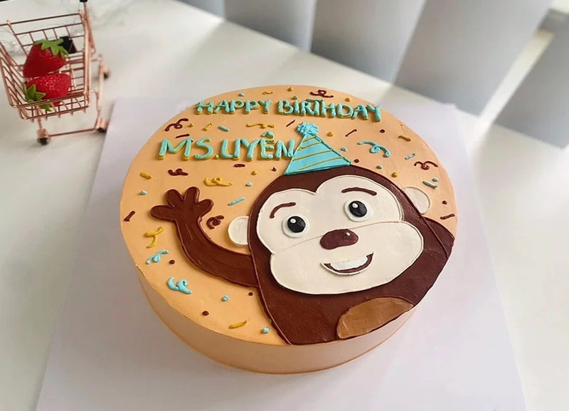 Bánh kem con khỉ nhỏ xinh trang trí hoa lá