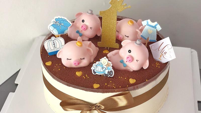 Bánh kem hình khủng long xanh lá dễ thương cho bé trai