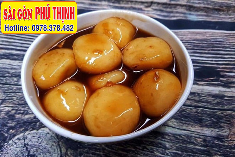 Bánh ngào mật mía nóng hổi với gừng và mè rang, đặc sản Nghệ An