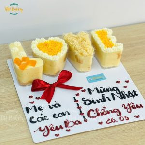 Bánh sinh nhật bông lan trứng muối trang trí chữ LOVE ý nghĩa
