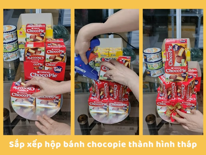 Hình ảnh minh họa bước đầu sắp xếp hộp bánh Chocopie thành tầng đế của tháp bánh tài lộc.
