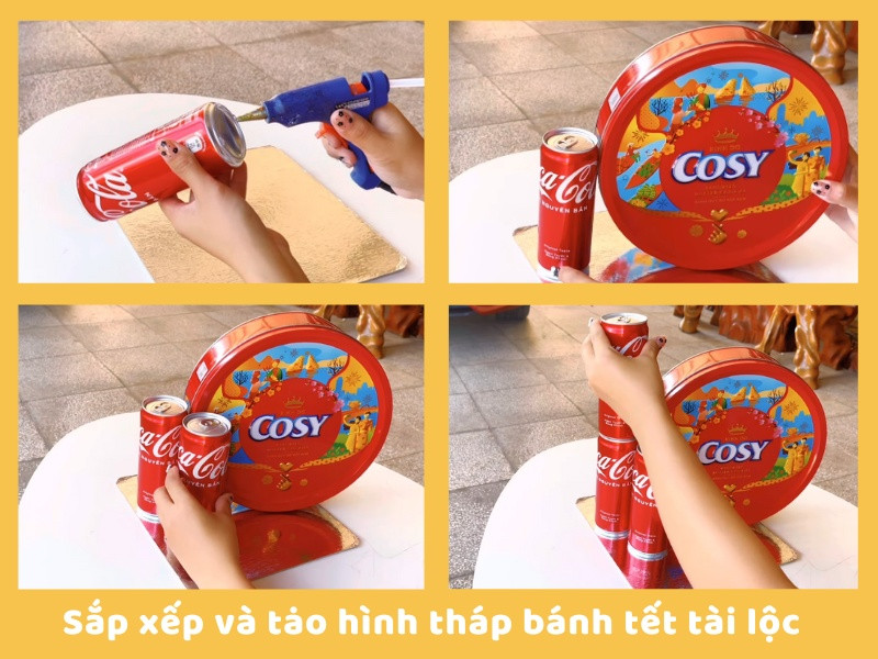 Sắp xếp lon nước ngọt và hộp bánh để tạo hình cho tháp bánh kẹo Tết.