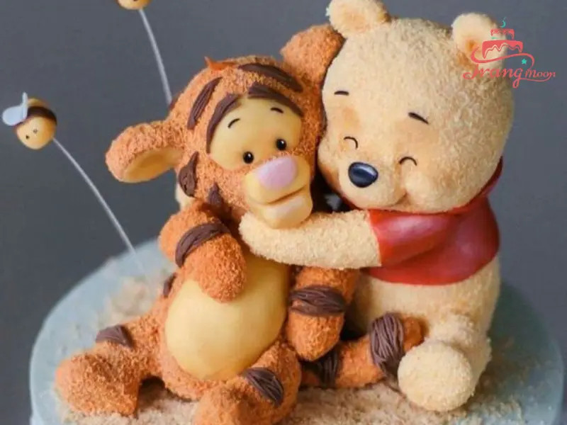 Bánh sinh nhật gấu Pooh vàng đỏ ngộ nghĩnh