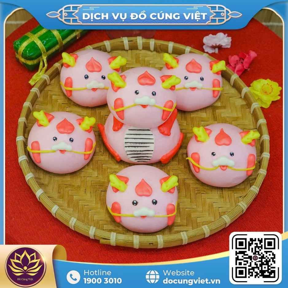 Mâm bánh bao 12 con giáp được tạo hình ngộ nghĩnh, mang ý nghĩa phù hợp với năm tuổi của trẻ.