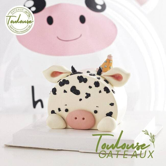 Mặt tiền tiệm bánh Toulouse, nơi cung cấp bánh sinh nhật tài xỉu với màu sắc trẻ trung